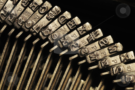 Close-up of old typewriter letter and symbol keys Close-up of old typewriter letter and symbol keys stock photo, Close-up of the striking surface of old typewriter letter and symbol keys by J.R. Bale