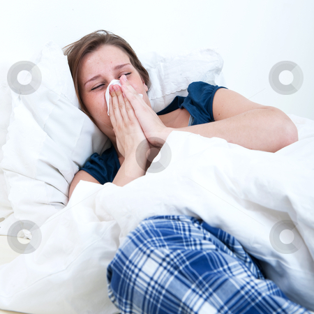 To use this stock image in your creative project, please select the size you need over to the right and click the "Add to Cart" button.
Your downloaded image will come with the Cutcaster watermark removed so don’t worry about the watermark you see on this page. Blowing nose stock photo, A girl blowing her nose while lying sick in bed. by Corepics VOF
