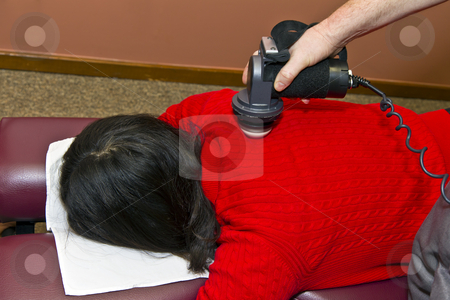 Back Work by Chiropractor Back Work by Chiropractor stock photo, Chiropractor working on patient's upper back/lower neck - shot on location by tab62