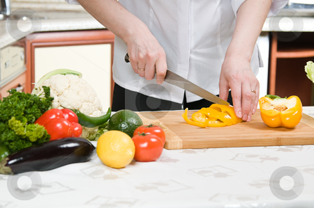 To use this stock image in your creative project, please select the size you need over to the right and click the "Add to Cart" button.
Your downloaded image will come with the Cutcaster watermark removed so don’t worry about the watermark you see on this page. Cooking stock photo, beautiful woman prepares food in the kitchen by Salauyou Yury