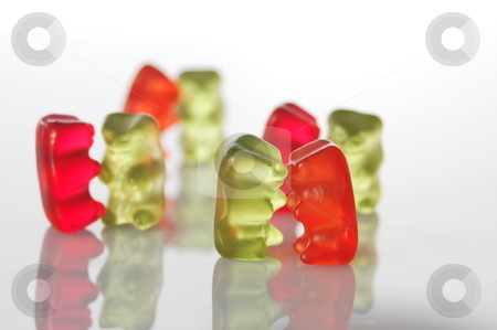To use this stock image in your creative project, please select the size you need over to the right and click the "Add to Cart" button.
Your downloaded image will come with the Cutcaster watermark removed so don’t worry about the watermark you see on this page. Gummy bears dancing at a party stock photo, sweet gummy bears dancing on a party on white background by Gunnar Pippel
