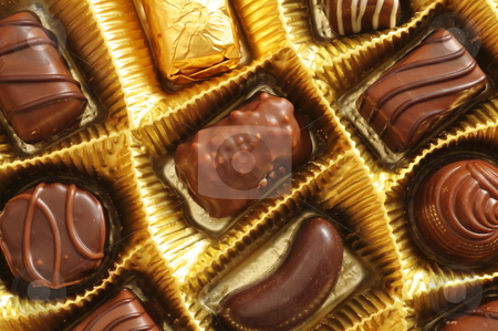 To use this stock image in your creative project, please select the size you need over to the right and click the "Add to Cart" button.
Your downloaded image will come with the Cutcaster watermark removed so don’t worry about the watermark you see on this page. Chocolate truffles in a box stock photo, chocolate truffles in a golden gift or present box by Gunnar Pippel
