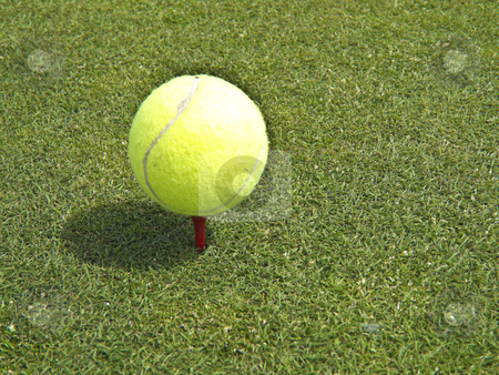To use this stock image in your creative project, please select the size you need over to the right and click the "Add to Cart" button.
Your downloaded image will come with the Cutcaster watermark removed so don’t worry about the watermark you see on this page. Tennis ball golf stock photo, tennis ball resting on a golf tee ready for the next stroke by Juliane Jacobs