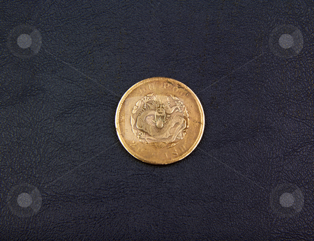 To use this stock image in your creative project, please select the size you need over to the right and click the "Add to Cart" button.
Your downloaded image will come with the Cutcaster watermark removed so don’t worry about the watermark you see on this page. Chinese Rare Dragon Copper Coin stock photo, Rare Chinese Copper Dragon Coin shot on Textured Holder by tab62