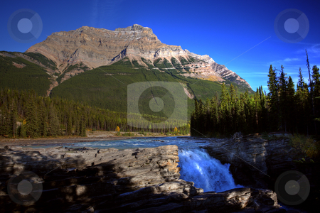 To use this stock image in your creative project, please select the size you need over to the right and click the "Add to Cart" button.
Your downloaded image will come with the Cutcaster watermark removed so don’t worry about the watermark you see on this page. Athabasca Falls in Jasper National Park stock photo, Athabasca Falls in Jasper National Park by Mark Duffy
