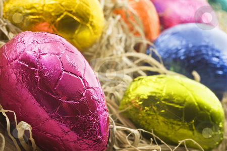 Colorful easter eggs in straw Colorful easter eggs in straw stock photo, Colorful easter eggs in straw - close up with shallow depth of field by tish1