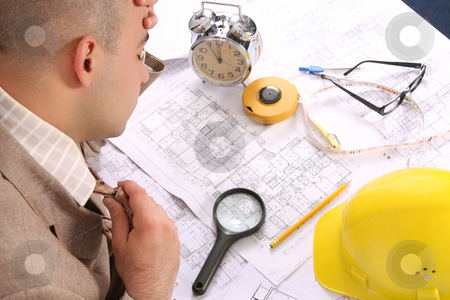 To use this stock image in your creative project, please select the size you need over to the right and click the "Add to Cart" button.
Your downloaded image will come with the Cutcaster watermark removed so don’t worry about the watermark you see on this page. A businessman sleepy with architectural plans stock photo, A businessman sleepy with architectural plans at desk by vladacanon1