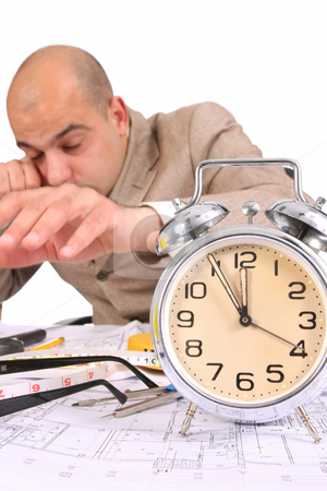 To use this stock image in your creative project, please select the size you need over to the right and click the "Add to Cart" button.
Your downloaded image will come with the Cutcaster watermark removed so don’t worry about the watermark you see on this page. A businessman sleepy with architectural plans stock photo, A businessman sleepy with architectural plans at desk by vladacanon1