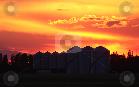 Colorful twilight and granary silhouettes Colorful twilight and granary silhouettes stock photo, Colorful twilight and granary silhouettes by Mark Duffy