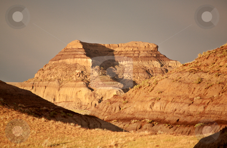 To use this stock image in your creative project, please select the size you need over to the right and click the "Add to Cart" button.
Your downloaded image will come with the Cutcaster watermark removed so don’t worry about the watermark you see on this page. Castle Butte in Big Muddy Valley of Saskatchewan stock photo, Castle Butte in Big Muddy Valley of Saskatchewan by Mark Duffy