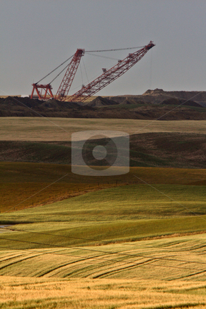 To use this stock image in your creative project, please select the size you need over to the right and click the "Add to Cart" button.
Your downloaded image will come with the Cutcaster watermark removed so don’t worry about the watermark you see on this page. Coal draglines in Southern Saskatchewan stock photo, Coal draglines in Southern Saskatchewan by Mark Duffy