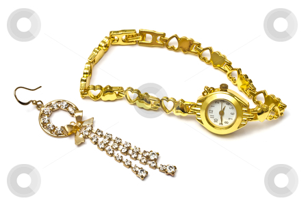 Golden watch and earring Golden watch and earring stock photo, Woman golden wrist watch and earring isolated on white background
by Ingvar Bjork