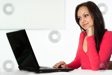 To use this stock image in your creative project, please select the size you need over to the right and click the "Add to Cart" button.
Your downloaded image will come with the Cutcaster watermark removed so don’t worry about the watermark you see on this page. Girl in the red with a laptop stock photo, beautiful girl in the red with a laptop by Alevtina Guzova