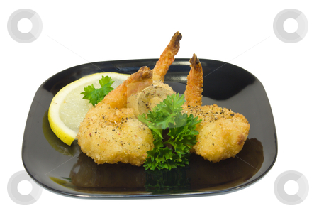 To use this stock image in your creative project, please select the size you need over to the right and click the "Add to Cart" button.
Your downloaded image will come with the Cutcaster watermark removed so don’t worry about the watermark you see on this page. Shrimp appetizer stock photo, trio of fried shrimp with parsley on a black plate by Lee Barnwell