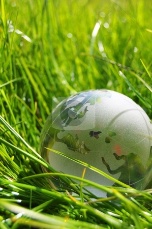 Ecology concept Ecology concept stock photo, eco ecology or environmental concept with green grass globe and copyspace by Gunnar Pippel