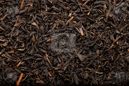 To use this stock image in your creative project, please select the size you need over to the right and click the "Add to Cart" button.
Your downloaded image will come with the Cutcaster watermark removed so don’t worry about the watermark you see on this page. Black tea background stock photo, some dried and fermented black tea leaves forming a background pattern by Jerax