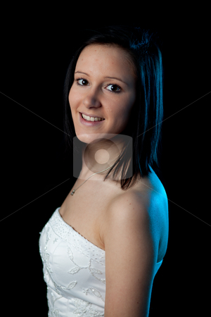 To use this stock image in your creative project, please select the size you need over to the right and click the "Add to Cart" button.
Your downloaded image will come with the Cutcaster watermark removed so don’t worry about the watermark you see on this page. Young woman portrait blue light stock photo, portrait of a young woman in a dress with blue backlight by Jerax