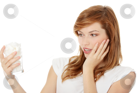 To use this stock image in your creative project, please select the size you need over to the right and click the "Add to Cart" button.
Your downloaded image will come with the Cutcaster watermark removed so don’t worry about the watermark you see on this page. Young surprised woman with lot of cugar in glass stock photo, Young shocked woman with lot of cugar in glass. Lot of callories in drink by Piotr_Marcinski
