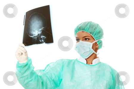 To use this stock image in your creative project, please select the size you need over to the right and click the "Add to Cart" button.
Your downloaded image will come with the Cutcaster watermark removed so don’t worry about the watermark you see on this page. Female doctor examining a head x-ray photo scan stock photo, Female doctor examining a head x-ray photo scan. Isolated on white by Piotr_Marcinski
