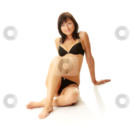Beautiful female body in black lingerie Beautiful female body in black lingerie stock photo, Beautiful female body in black lingerie isolated by Piotr_Marcinski