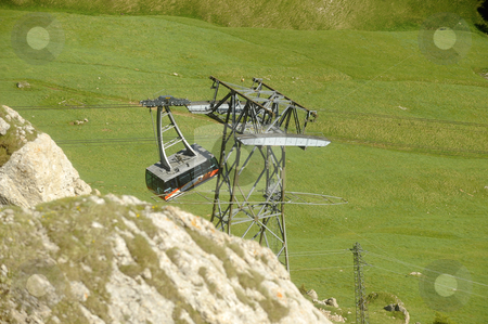To use this stock image in your creative project, please select the size you need over to the right and click the "Add to Cart" button.
Your downloaded image will come with the Cutcaster watermark removed so don’t worry about the watermark you see on this page. Ski lifts stock photo, ski lifts in the rocky mountains of the Dolomites by freeteo