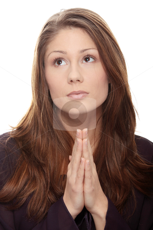 Young caucasian woman praying Young caucasian woman praying stock photo, Closeup portrait of a young caucasian woman praying by Piotr_Marcinski