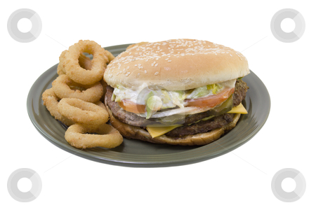 Double cheeseburger onion rings Double cheeseburger onion rings stock photo, double stack cheeseburger with tomato, lettuce, onions, mayo, pickles and onion rings on a green plate isolated on white by Lee Barnwell
