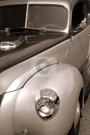 To use this stock image in your creative project, please select the size you need over to the right and click the "Add to Cart" button.
Your downloaded image will come with the Cutcaster watermark removed so don’t worry about the watermark you see on this page. Classic car stock photo, Close up shot of classic car in sepia color by Sreedhar Yedlapati