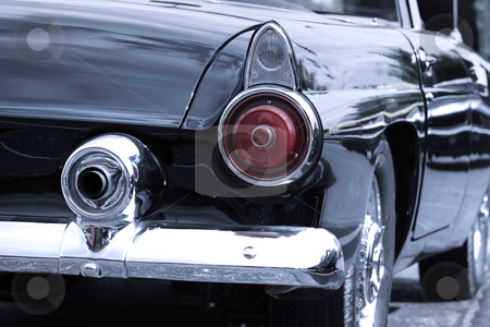 To use this stock image in your creative project, please select the size you need over to the right and click the "Add to Cart" button.
Your downloaded image will come with the Cutcaster watermark removed so don’t worry about the watermark you see on this page. Rear view of classic car stock photo, Classic car rear view in black and white by Sreedhar Yedlapati