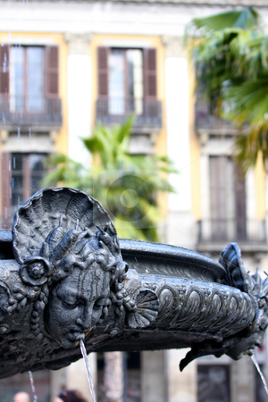 To use this stock image in your creative project, please select the size you need over to the right and click the "Add to Cart" button.
Your downloaded image will come with the Cutcaster watermark removed so don’t worry about the watermark you see on this page. Fountain Royal Palace in Barcelona stock photo, details of fountain Royal Palace in Barcelona, Spain (placa Reial) by vladacanon1