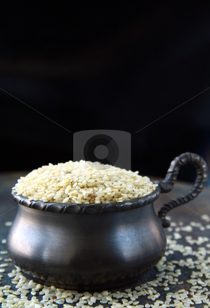 To use this stock image in your creative project, please select the size you need over to the right and click the "Add to Cart" button.
Your downloaded image will come with the Cutcaster watermark removed so don’t worry about the watermark you see on this page. Close up of sesame seeds on a wood table stock photo, Close up of sesame seeds on a wood table by Olga Kriger