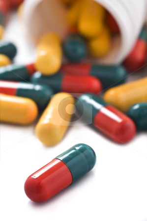 To use this stock image in your creative project, please select the size you need over to the right and click the "Add to Cart" button.
Your downloaded image will come with the Cutcaster watermark removed so don’t worry about the watermark you see on this page. Yellow red and green capsules stock photo, Yellow red and green capsules with bottle by tish1