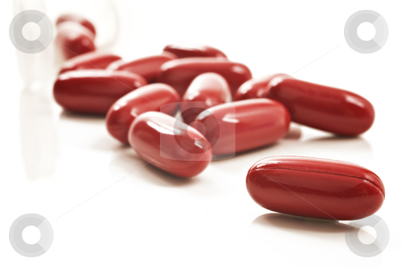 Red pills and pill bottle on white background Red pills and pill bottle on white background stock photo, Red pills and pill bottle by tish1