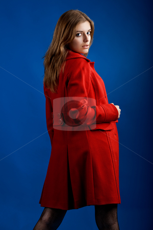 To use this stock image in your creative project, please select the size you need over to the right and click the "Add to Cart" button.
Your downloaded image will come with the Cutcaster watermark removed so don’t worry about the watermark you see on this page. Woman in Red stock photo, Portrait of a beautiful and sexy young model posing with a red jacket by ikostudio
