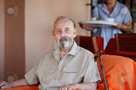 To use this stock image in your creative project, please select the size you need over to the right and click the "Add to Cart" button.
Your downloaded image will come with the Cutcaster watermark removed so don’t worry about the watermark you see on this page. Senior man being brought meal in residential care home stock photo, senior man being brought meal in residential care home by mandygodbehear
