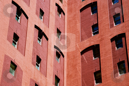 To use this stock image in your creative project, please select the size you need over to the right and click the "Add to Cart" button.
Your downloaded image will come with the Cutcaster watermark removed so don’t worry about the watermark you see on this page. Office Building stock photo, Office buildings in the city with a close up view by instinia