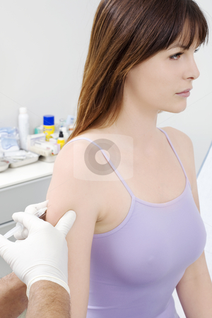 To use this stock image in your creative project, please select the size you need over to the right and click the "Add to Cart" button.
Your downloaded image will come with the Cutcaster watermark removed so don’t worry about the watermark you see on this page. Young caucasian woman receiving a puncture from a doctor stock photo, young caucasian woman receiving a puncture from a doctor by ambrophoto