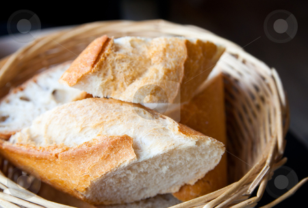 Bread in basket Bread in basket stock photo, bread in basket - little roll breads in basket on table by ilolab