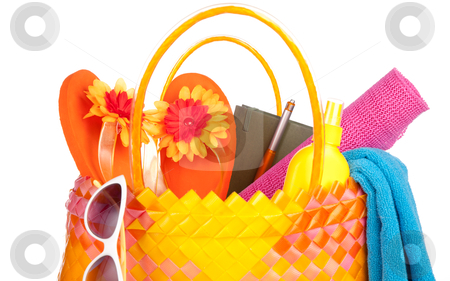 Beach bag Beach bag stock photo, beach bag with towel sunglasses flip-flops and hat.isolated on white by twixx