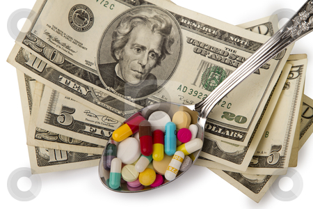 To use this stock image in your creative project, please select the size you need over to the right and click the "Add to Cart" button.
Your downloaded image will come with the Cutcaster watermark removed so don’t worry about the watermark you see on this page. Spoon full of tablets stock photo, spoon full of tablets and a few dollars banknotes by Valery Kraynov