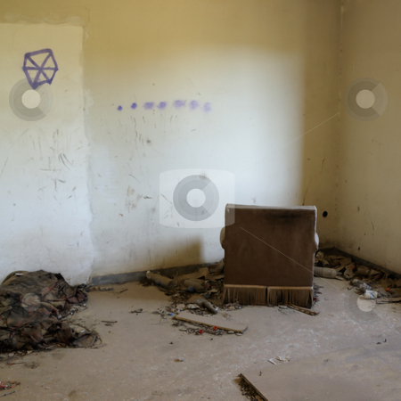 The waiting room The waiting room stock photo, Armchair facing the wall in abandoned house. Drug use paraphernalia on the floor. by sirylok