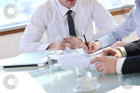 To use this stock image in your creative project, please select the size you need over to the right and click the "Add to Cart" button.
Your downloaded image will come with the Cutcaster watermark removed so don’t worry about the watermark you see on this page. Group of business people at meeting stock photo, young business people group have meeting at conference room and have discusion about new ideas plans and problems by Benis Arapovic