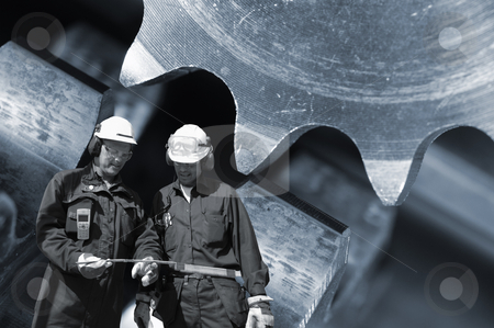 To use this stock image in your creative project, please select the size you need over to the right and click the "Add to Cart" button.
Your downloaded image will come with the Cutcaster watermark removed so don’t worry about the watermark you see on this page. Metal and steel workers in action stock photo, two workers, engineers, with giant gear wheel machinery in background, symbolic with steel and metal industry by lagereek