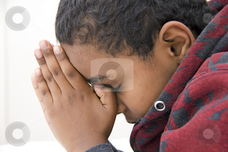 To use this stock image in your creative project, please select the size you need over to the right and click the "Add to Cart" button.
Your downloaded image will come with the Cutcaster watermark removed so don’t worry about the watermark you see on this page. A Young kid praying stock photo, A young kid during his daily prayer by derejeb