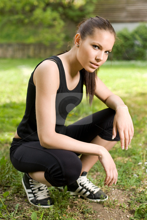 To use this stock image in your creative project, please select the size you need over to the right and click the "Add to Cart" button.
Your downloaded image will come with the Cutcaster watermark removed so don’t worry about the watermark you see on this page. Beautiful slim brunette resting while workout. stock photo, Beautiful fit slender brunette resting while workout outdoors in nature. by exvivo