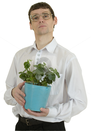 To use this stock image in your creative project, please select the size you need over to the right and click the "Add to Cart" button.
Your downloaded image will come with the Cutcaster watermark removed so don’t worry about the watermark you see on this page. Man in spectacles with window plant in flowerpot stock photo, Portrait man in spectacles with window plant in flowerpot by Alexey Romanov
