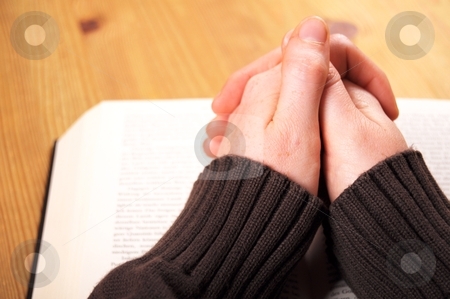 To use this stock image in your creative project, please select the size you need over to the right and click the "Add to Cart" button.
Your downloaded image will come with the Cutcaster watermark removed so don’t worry about the watermark you see on this page. Pray stock photo, praying hand and book on desk showing religion concept by Gunnar Pippel