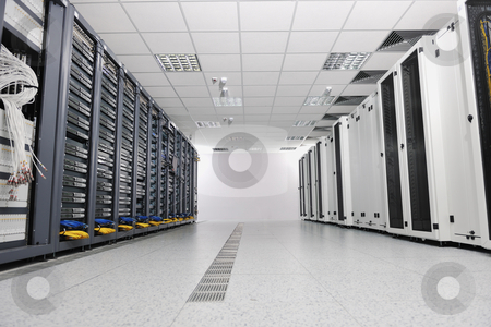 To use this stock image in your creative project, please select the size you need over to the right and click the "Add to Cart" button.
Your downloaded image will come with the Cutcaster watermark removed so don’t worry about the watermark you see on this page. Network server room stock photo, internet network server room with computers racks and digital receiver for digital tv by Benis Arapovic