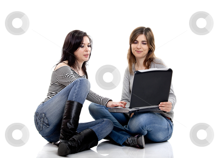 To use this stock image in your creative project, please select the size you need over to the right and click the "Add to Cart" button.
Your downloaded image will come with the Cutcaster watermark removed so don’t worry about the watermark you see on this page. Working with a Laptop stock photo, Two female young students working with a laptop by ikostudio