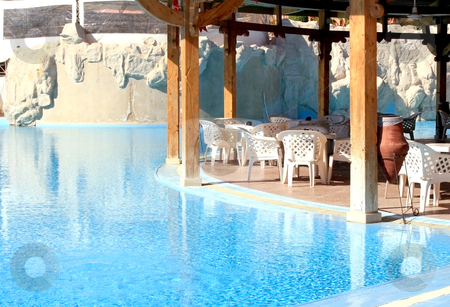 To use this stock image in your creative project, please select the size you need over to the right and click the "Add to Cart" button.
Your downloaded image will come with the Cutcaster watermark removed so don’t worry about the watermark you see on this page. Lobby-bar among swimming-pools stock photo, Lobby-bar among swimming-pools on territory of hotel in Makady bay by Tatjana Keisa
